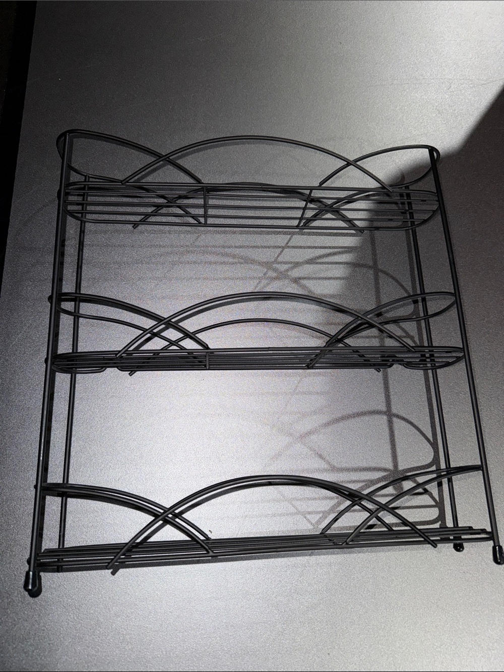 Black Metal 3-Tier Wall Display Shelf - Elegant Curved Design